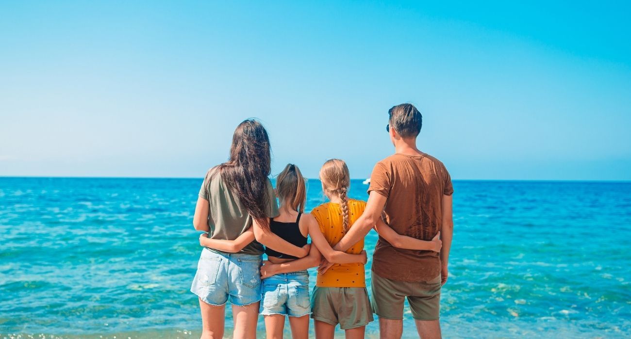 family looking out onto the ocean