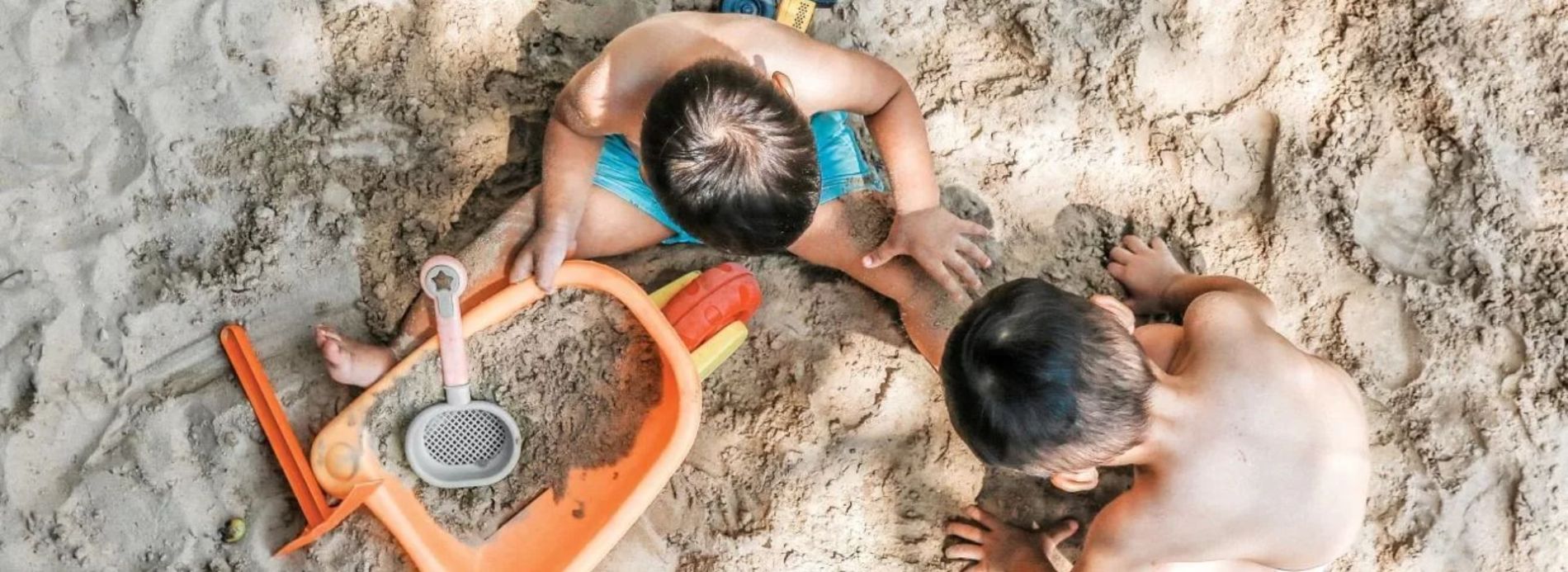 Kids playing in sand