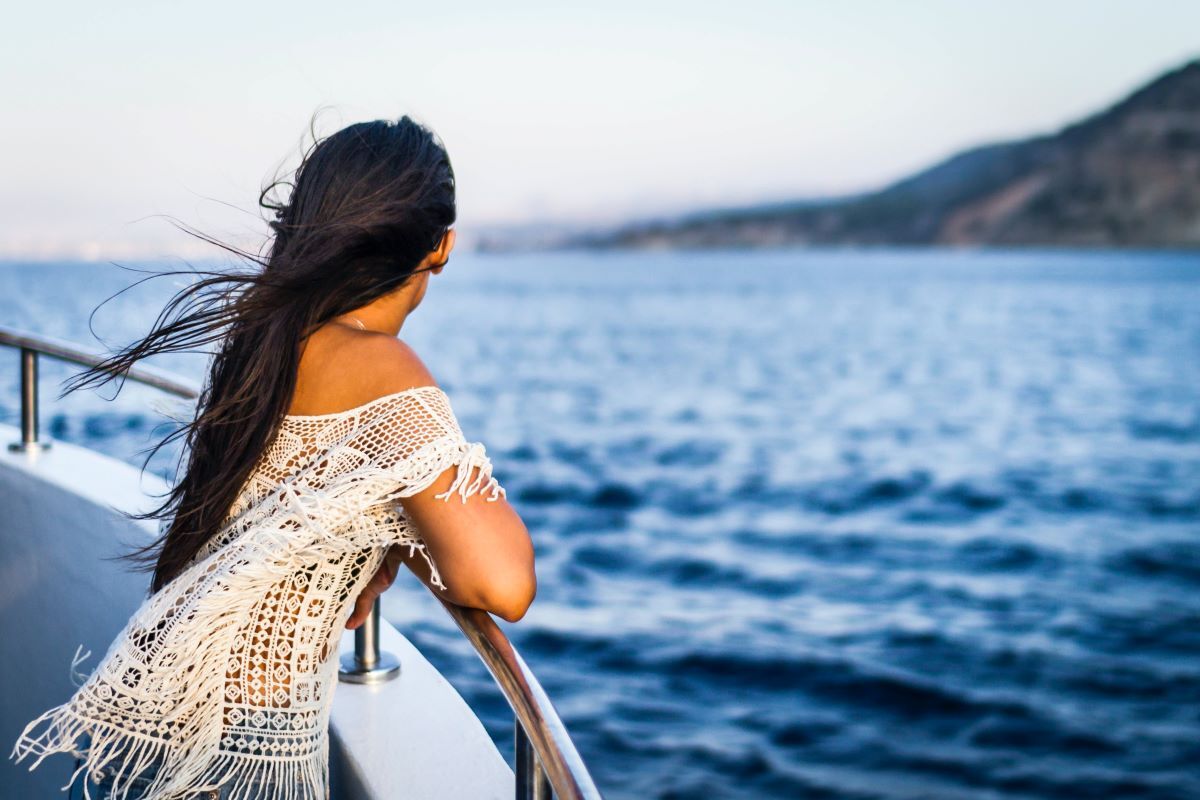 woman on boat on kauai waters